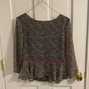 Peplum patterned top